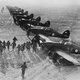 Royal Canadian Air Force pilots scramble to their waiting Hurricanes to intercept incoming Luftwaffe bombers during the Battle of Britain (RCAF)